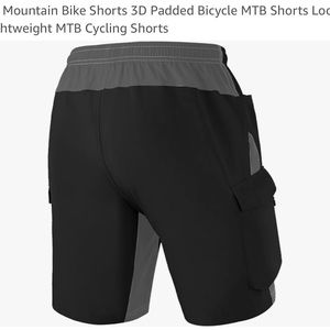 Set of two loose fit Vayager Men’s Biking Shorts, Sz medium, black and khaki.